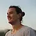 handsome-man-smiling-in-the-park.webp