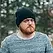 young-man-with-redhead-beard-and-cap.webp