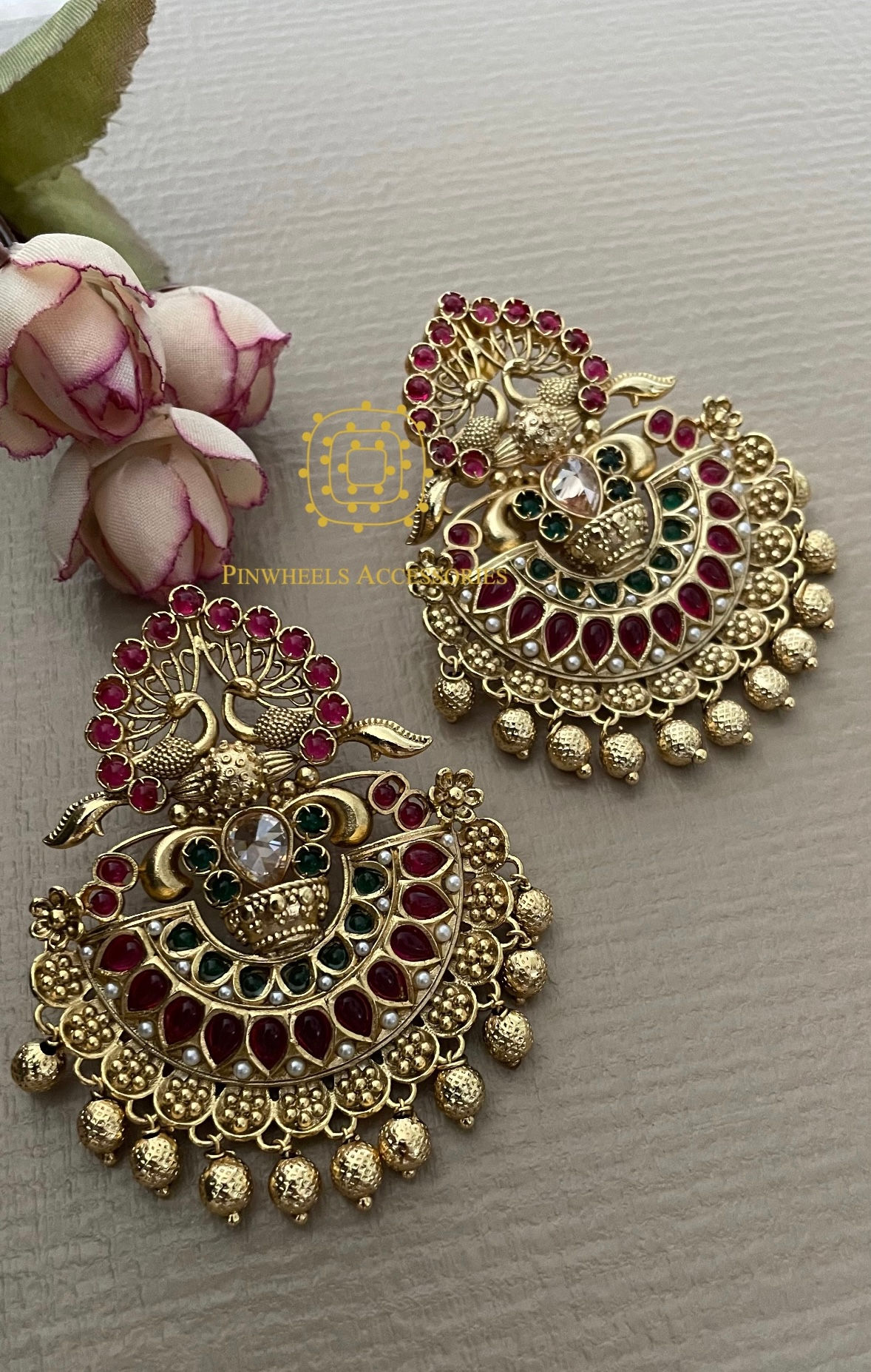 STATEMENT EARRINGS FEATURING TWIN PEACOCKS