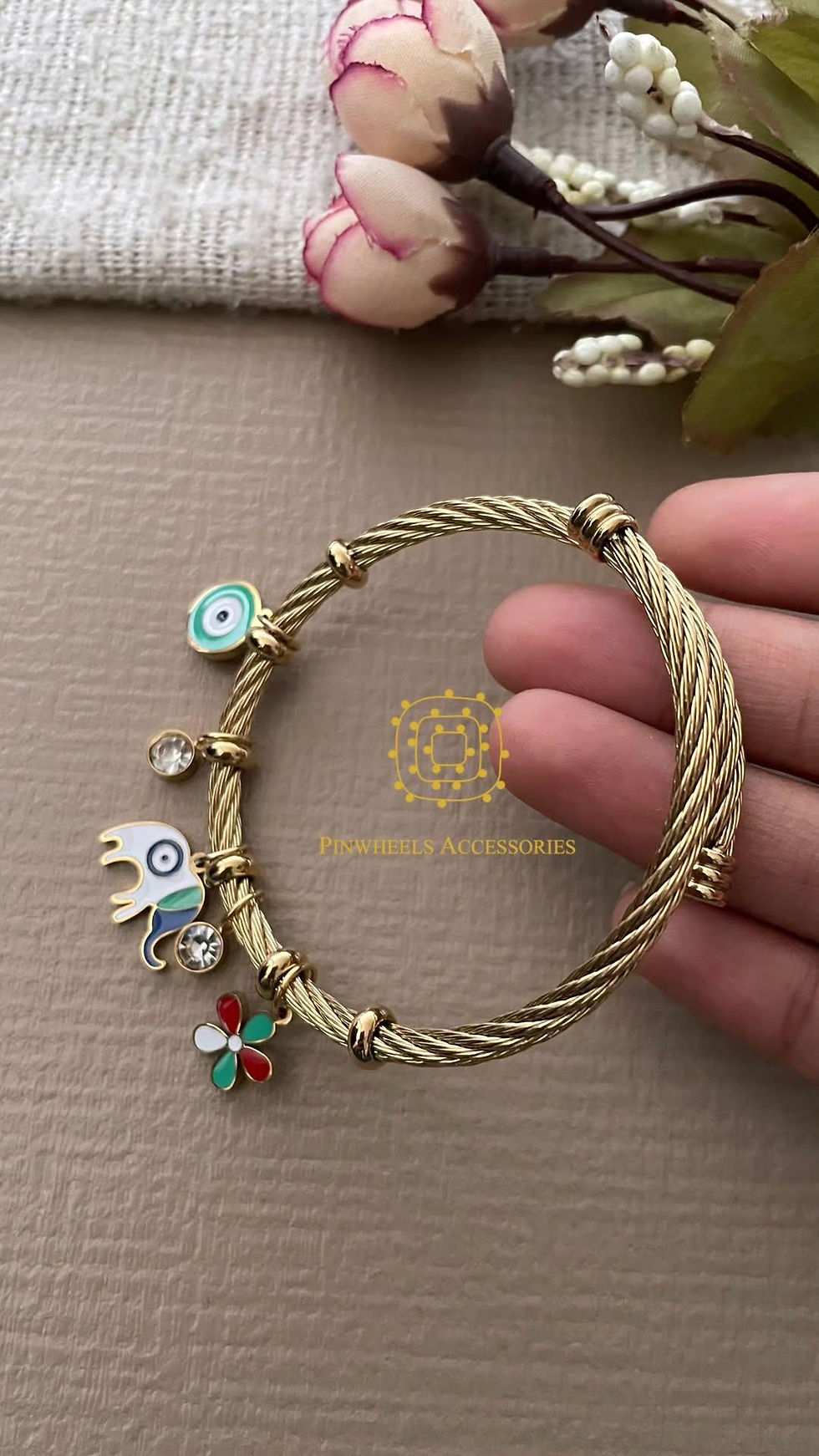 ADJUSTABLE CHARMS BRACELET