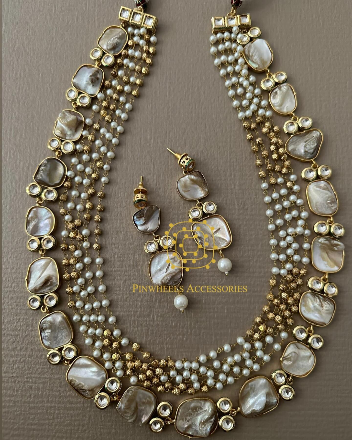 MOTHER OF PEARL WITH LONG BEADED CHAIN 