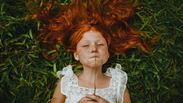 girl chillaxing on the grass