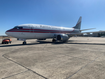 Photo of Full Plane parked on the tarmac