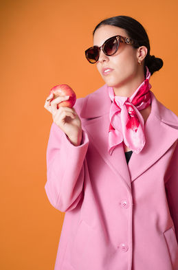 Laura Lopez model Spain studio fashion editorial posing in elegant winter jacket stylish sunglasses sleek updo hair Salitre Models