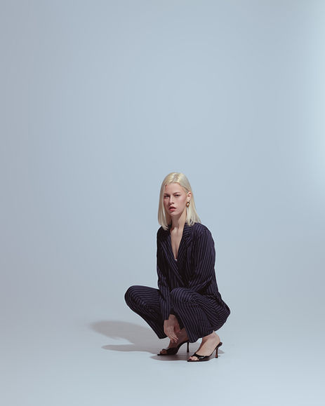 Fashion model Tiffany Jade posing in a high-fashion editorial shoot for Salitre Models.