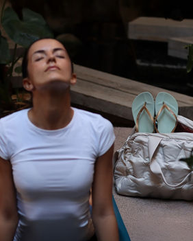Female model Daniella Falcon posing for the Ipanema Spain footwear campaign at the tropical Lopesan Baobab Resort.