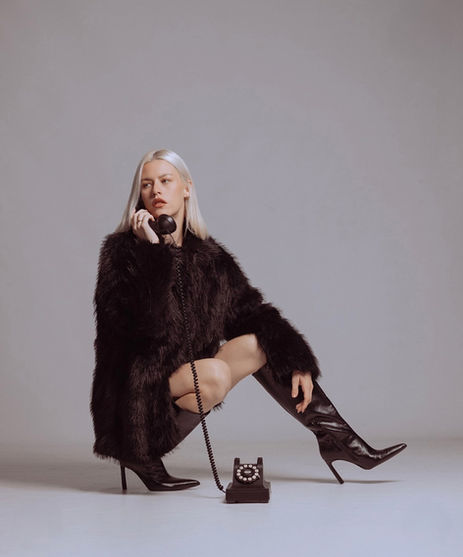 Fashion model Tiffany Jade posing in a high-fashion editorial shoot for Salitre Models.