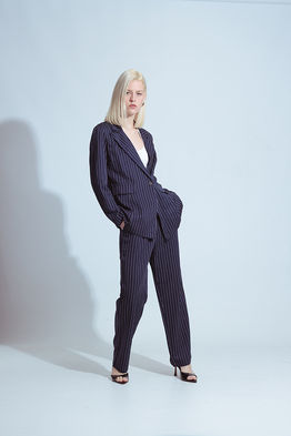 Fashion model Tiffany Jade posing in a high-fashion editorial shoot for Salitre Models.