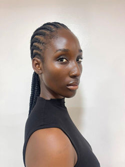 Natural unedited model polaroid of Chauntelle Ejiogu in a studio setting for international scouting.