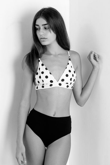 Yashira Suárez posing for professional digital polaroids in basic undergarments inside a photo studio – Female model portfolio for Salitre Models.