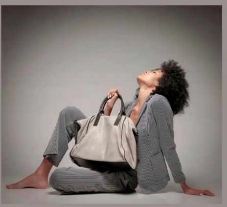 Camila Batista international female model luxury fashion accessories designer handbag commercial campaign portfolio Salitre Models.