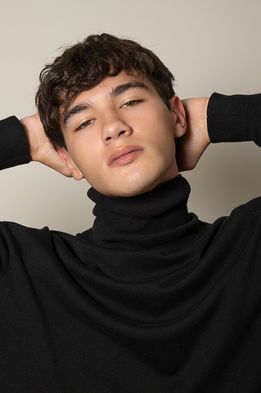 Eduardo Sanz male model studio portrait black turtleneck sweater close up Salitre Models