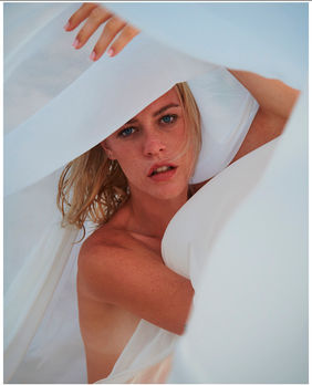 Fashion model Tiffany Jade posing in a high-fashion editorial shoot for Salitre Models.