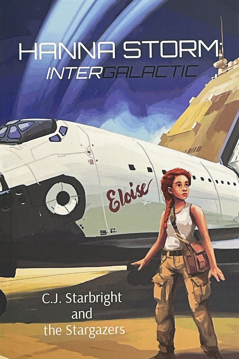 Illustrated book cover for Hanna Storm: Intergalactic by C.J. Starbright and the Stargazers. The cover features a young woman with red braided hair, dressed in a white tank top and cargo pants, standing confidently in front of a white and gold spaceship named "Eloise." A deep purple and blue cosmic sky swirls in the background, evoking a sense of adventure and exploration.