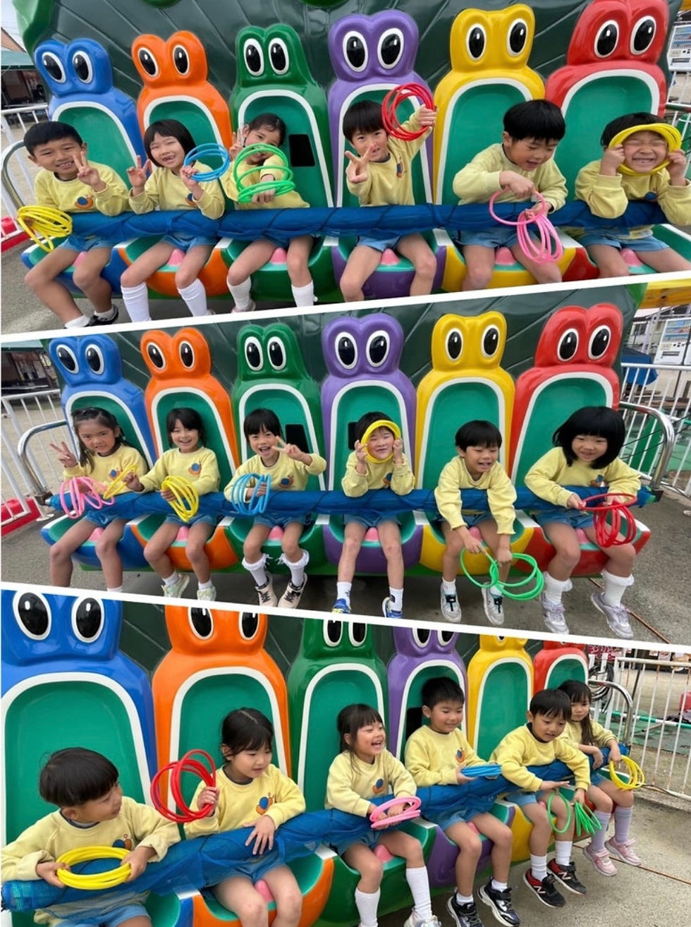 遊園地の乗り物で楽しむ子どもたち