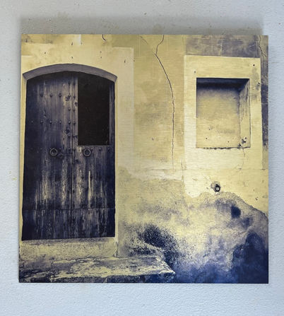 Typical Majorcan door and wall. The colour reflects the sun set
