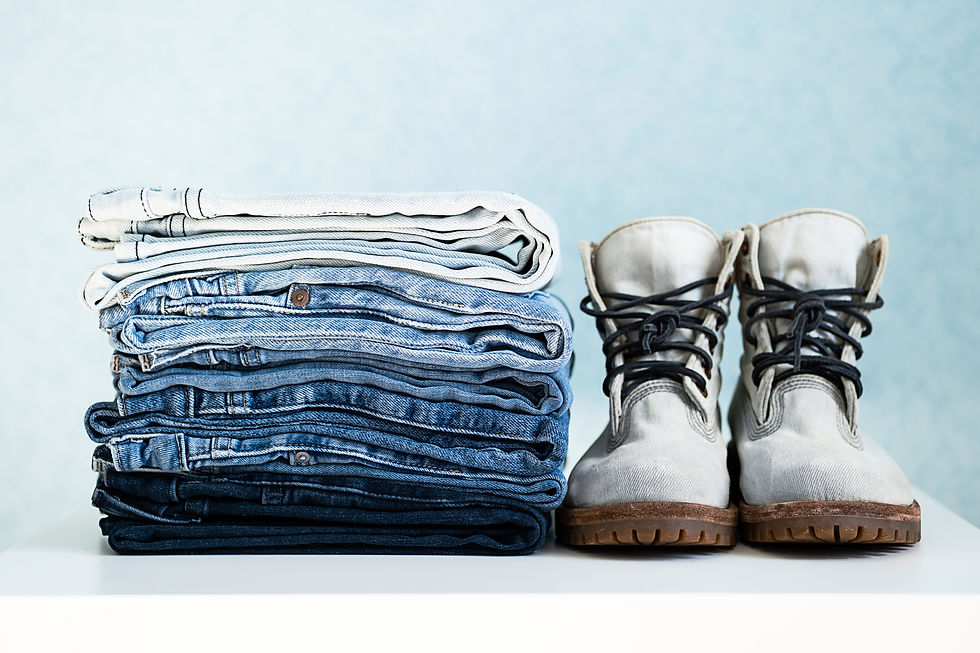 denim-collection-stack-of-jeans-and-pair-of-boots-2023-11-27-05-35-56-utc.jpg