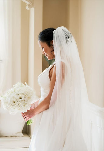 Bride Holding White Hydrangea and Calla Lily Bridal Bouquet