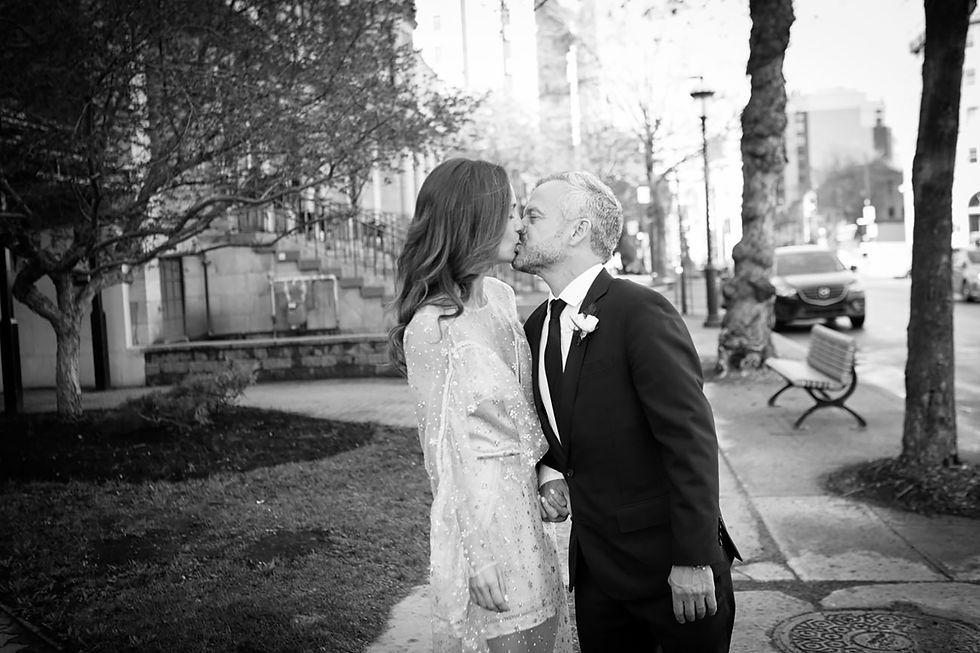 bride and groom first kiss