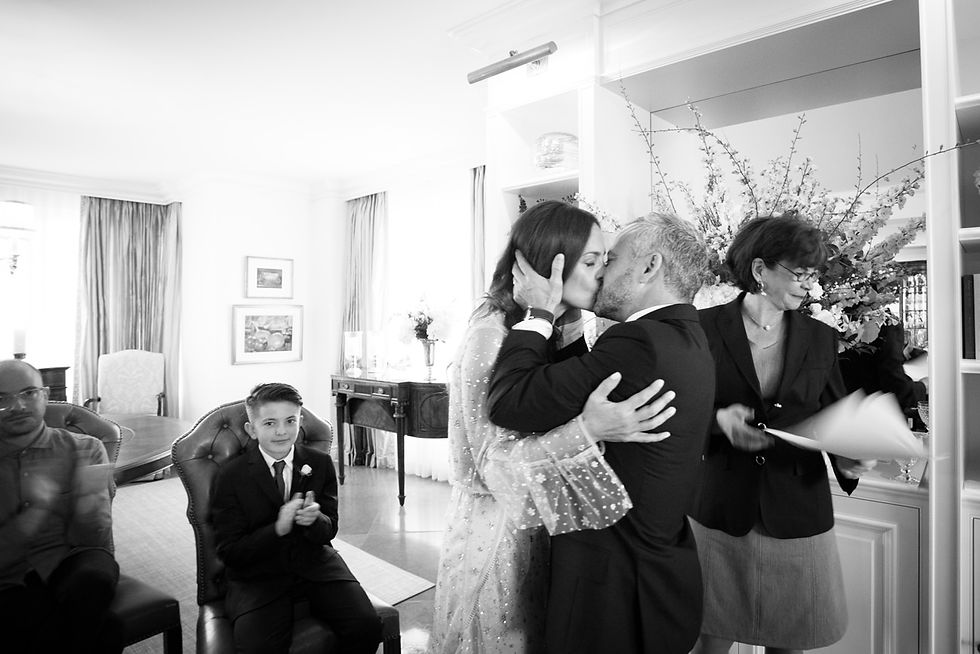 Black and white wedding kiss