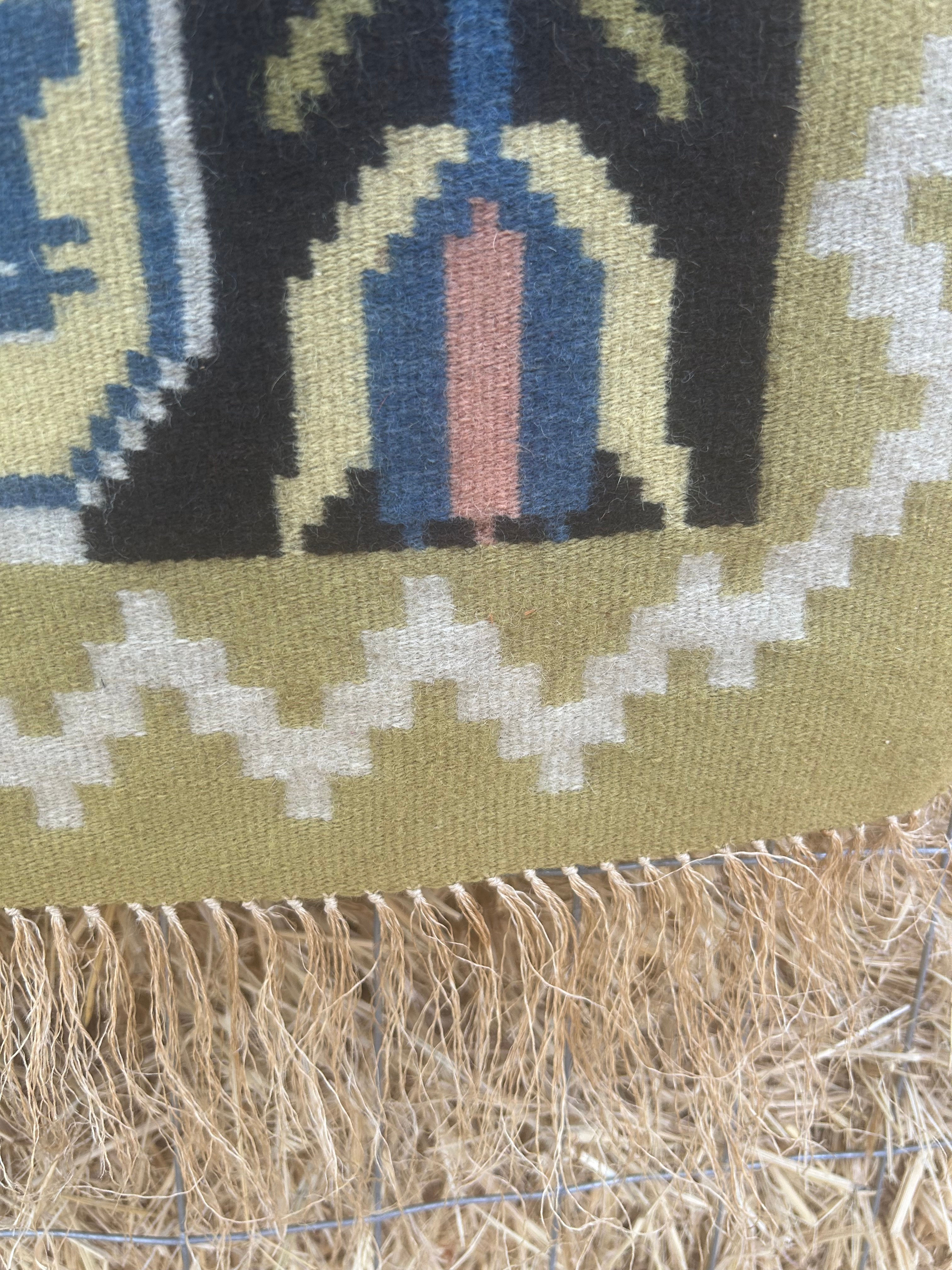 Röllakan, Swedish vintage weave with traditional symbols