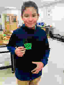 Marquez poses with keychain he made in the VW eLab.