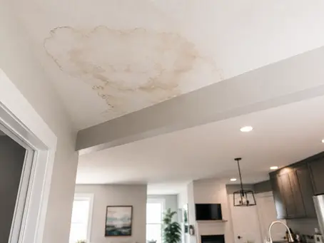 water stained ceiling indicates a leaky roof above