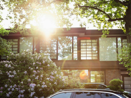 modern suburban home exterior large windows daylight