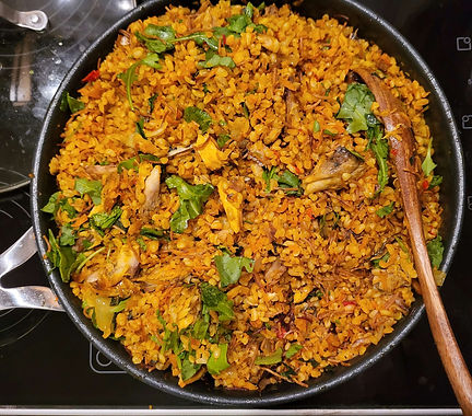 Celebratory Nigeria Native Oil Rice (bulgur) with grilled fish