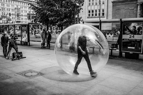 Man walking down the street in a bubble