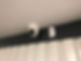Ceiling camera and motion sensor on metal wall, showing reliable alarms.