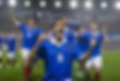 Excited football player celebrating