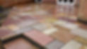 Newly installed multi-colored block paving patio with a wooden border.
