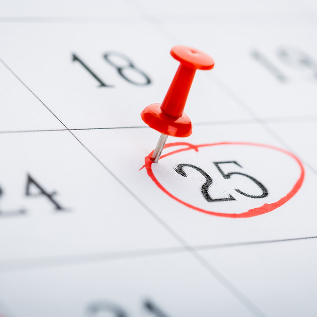 Calendar page marked with an important date in red pen