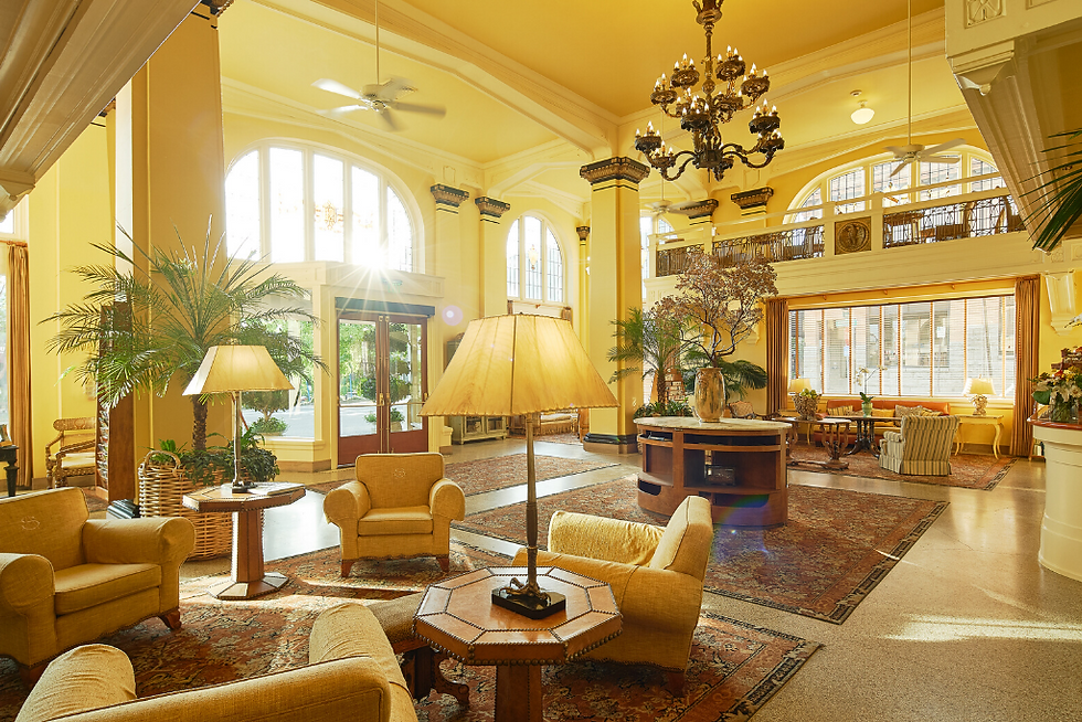 Elegant Ashland Springs Hotel lobby with armchairs and chandelier