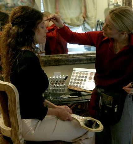 Ferris doing Esthetic care on womani Beverly Hills