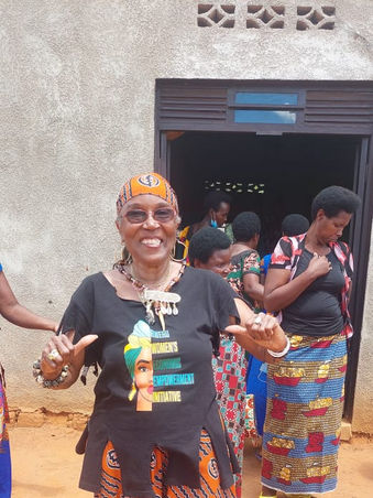 Mama at rweru in black tee.JPG