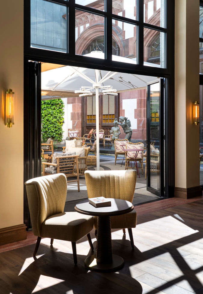 Interior at Brunfels Hotel Mainz with distinctive lighting atmosphere