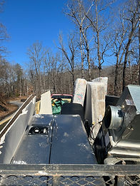 Appliance removal crew hauling refrigerator in Forsyth County
