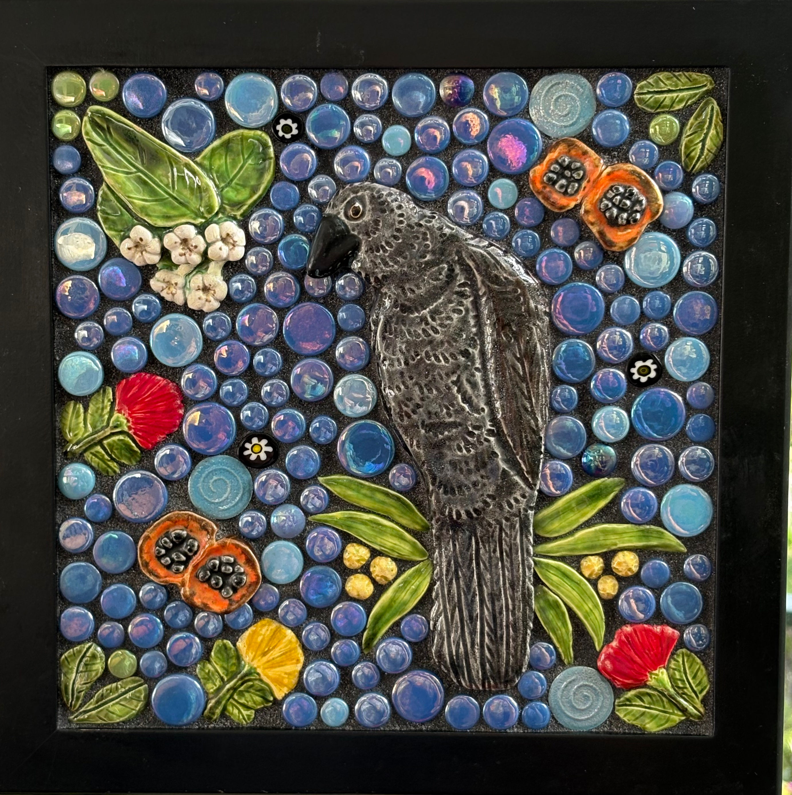 Alala (Hawaiian crow) ceramic and glass mosaic, framed 10 x 10 x 0.5 inches, front view
