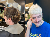 DJ Post Percy with a full creamy blonde hairstyle transformation done by Sunny Sun Hair, showcasing a sleek and confident look perfect for performances