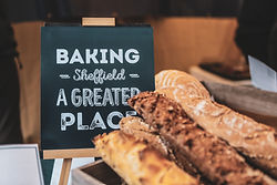 The Suited Baker