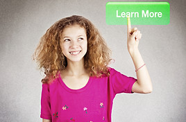 Closeup portrait young happy, smiling girl pressing digital learn more button on interface