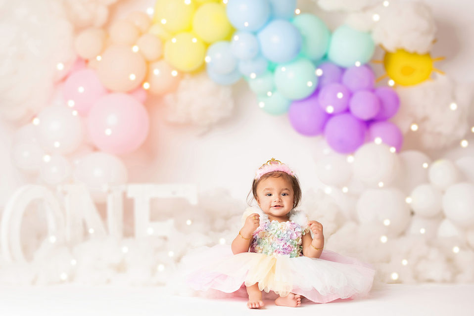 3. Colorful balloon and cake setup for baby girl’s cake smash in Dallas area. Rainbow themed.