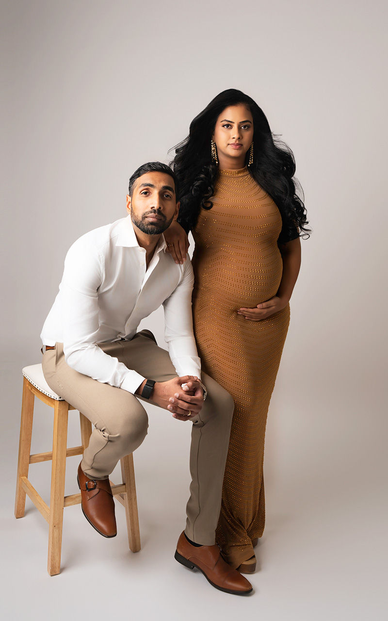 Editorial maternity photography Frisco Texas - modern couples portrait caramel dress neutral tones studio