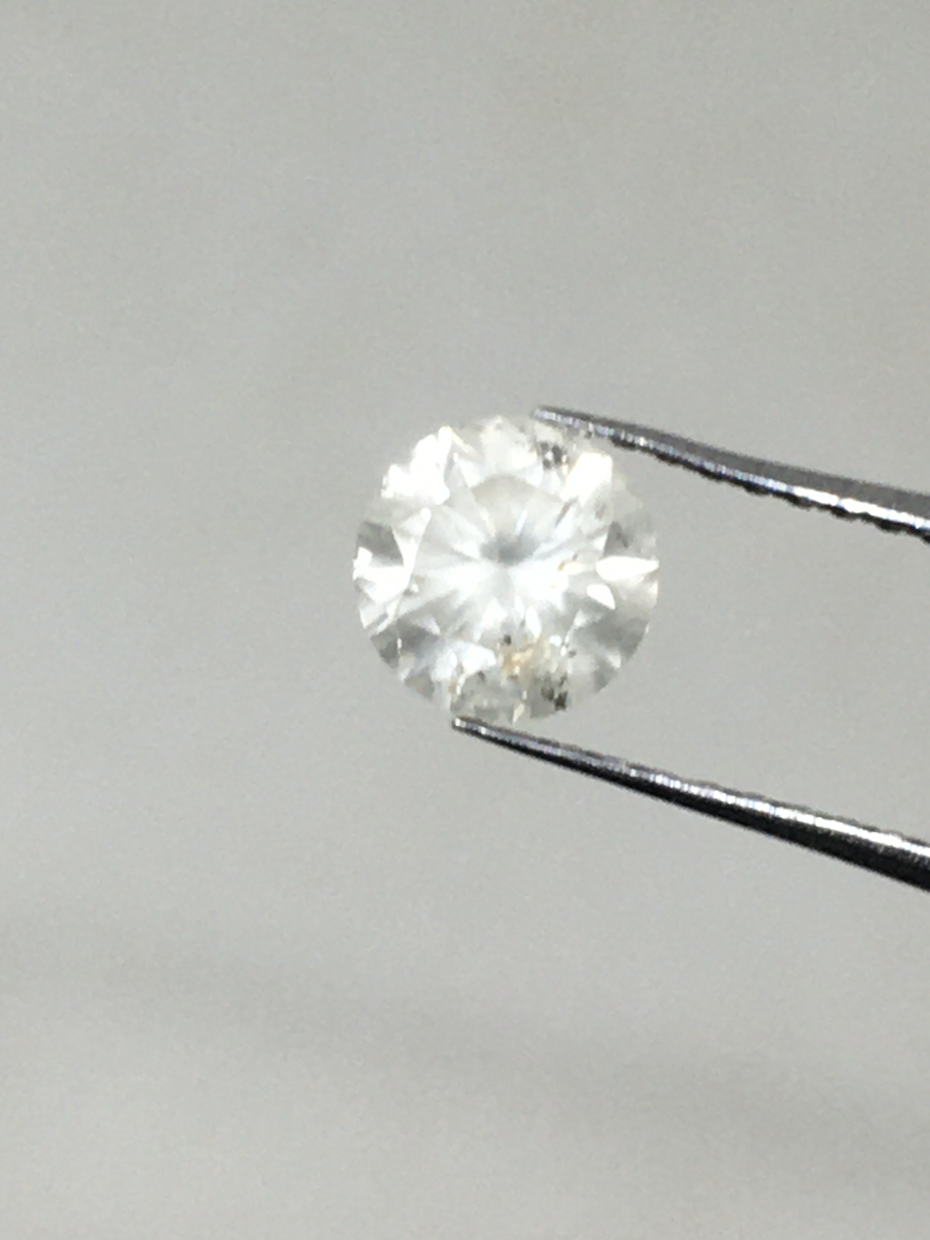 0.64 CT 5.2 MM Natural Salt and Pepper Round Cut Brilliant cut Diamond