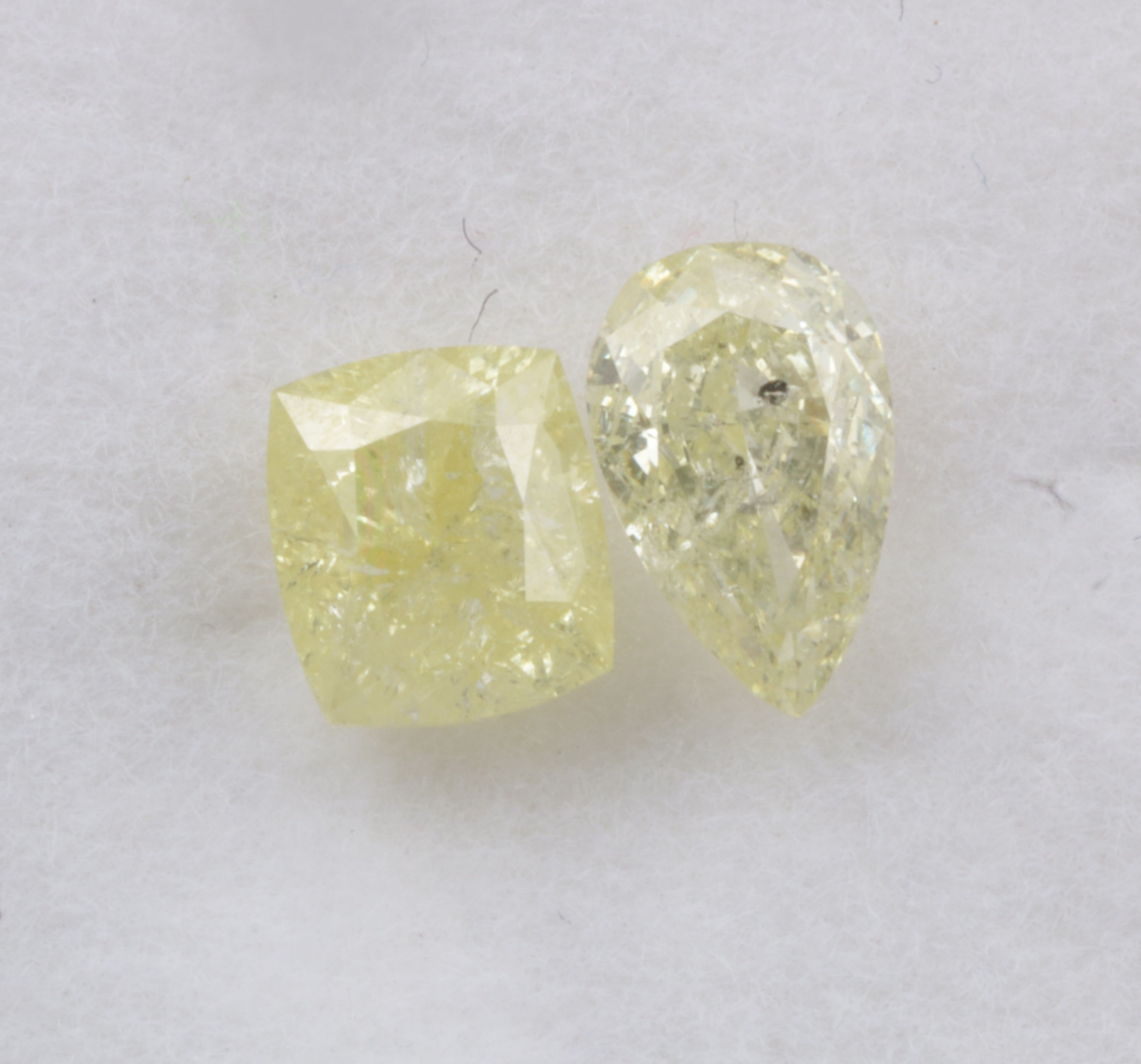0.81 CT 2pcs Natural Fancy Yellow color Diamond Pear/Cushion cut Diamond