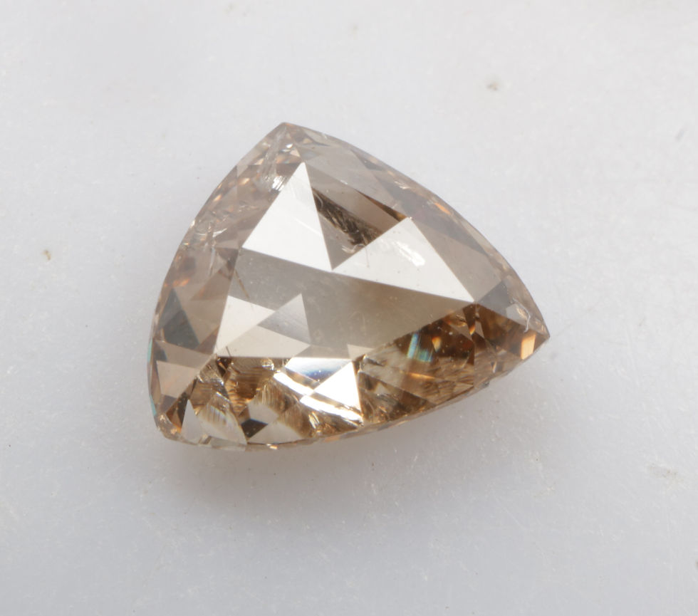 1.13 CT 7.5 X 6.2 MM Natural Fancy Trillion cut Diamond Light Champagne color