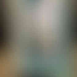 Greeting card featuring a lighthouse scene in tones of blue and green with green ribbon and a trio of cream embellishments