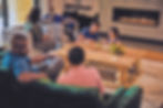 family-enjoying-fireplace-in-living-room.jpg